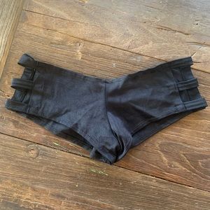 iHeartRaves Black Cutout Booty Shorts